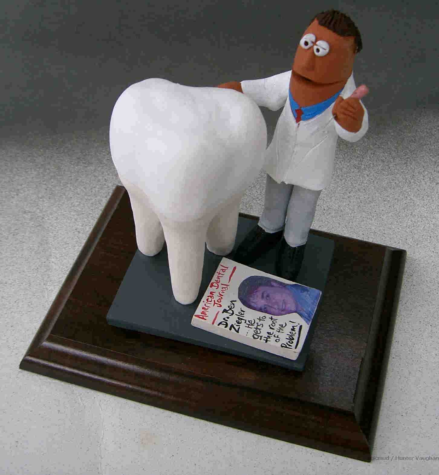 Endodontist figurine utilizing the actual dental file, a unique Dentist's gift