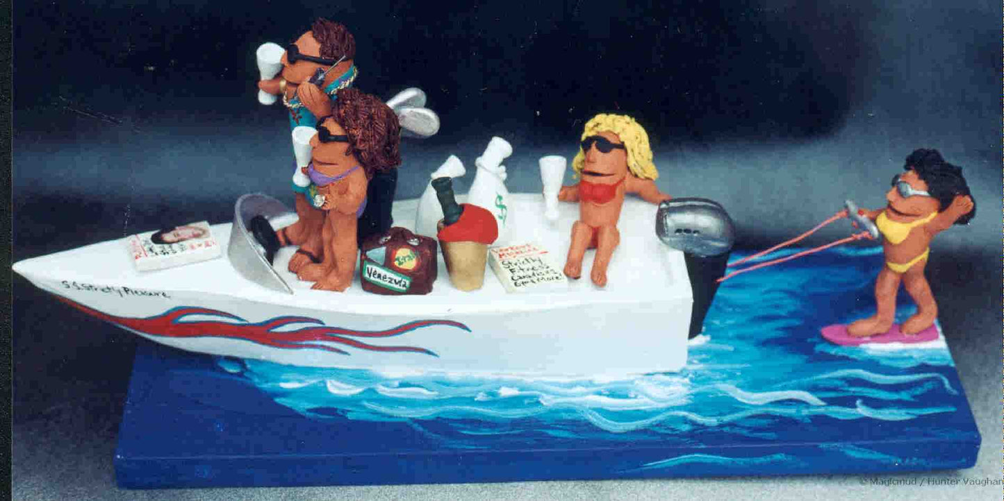 Personalized sports figurine of Mr. Cool in his yacht wearing a gold chain and shades, and his "babe" is sporting a big diamond while cruisin' in their yacht...the Good Life...Immortalized!