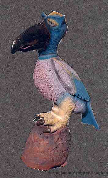 unusual bird sculpture of handmade fired clay