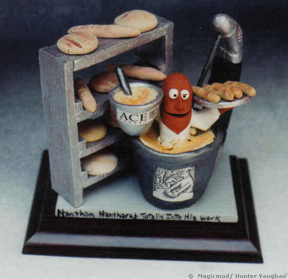 personalized figurine of baker immersed in mixer of dough