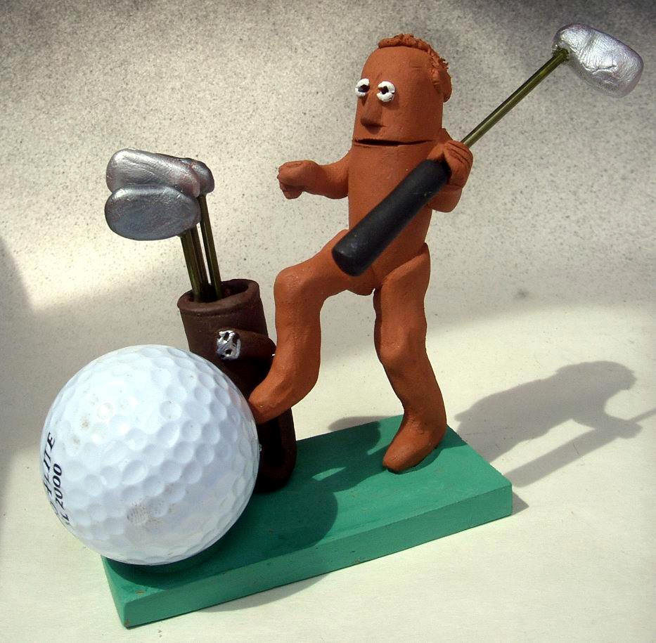 Golfer caricature statue