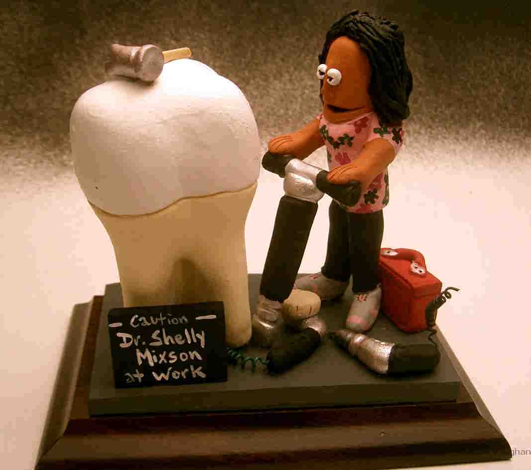 Personalized oral surgeons gift....let us custom create a great ceramic statue for the dental professional in your life