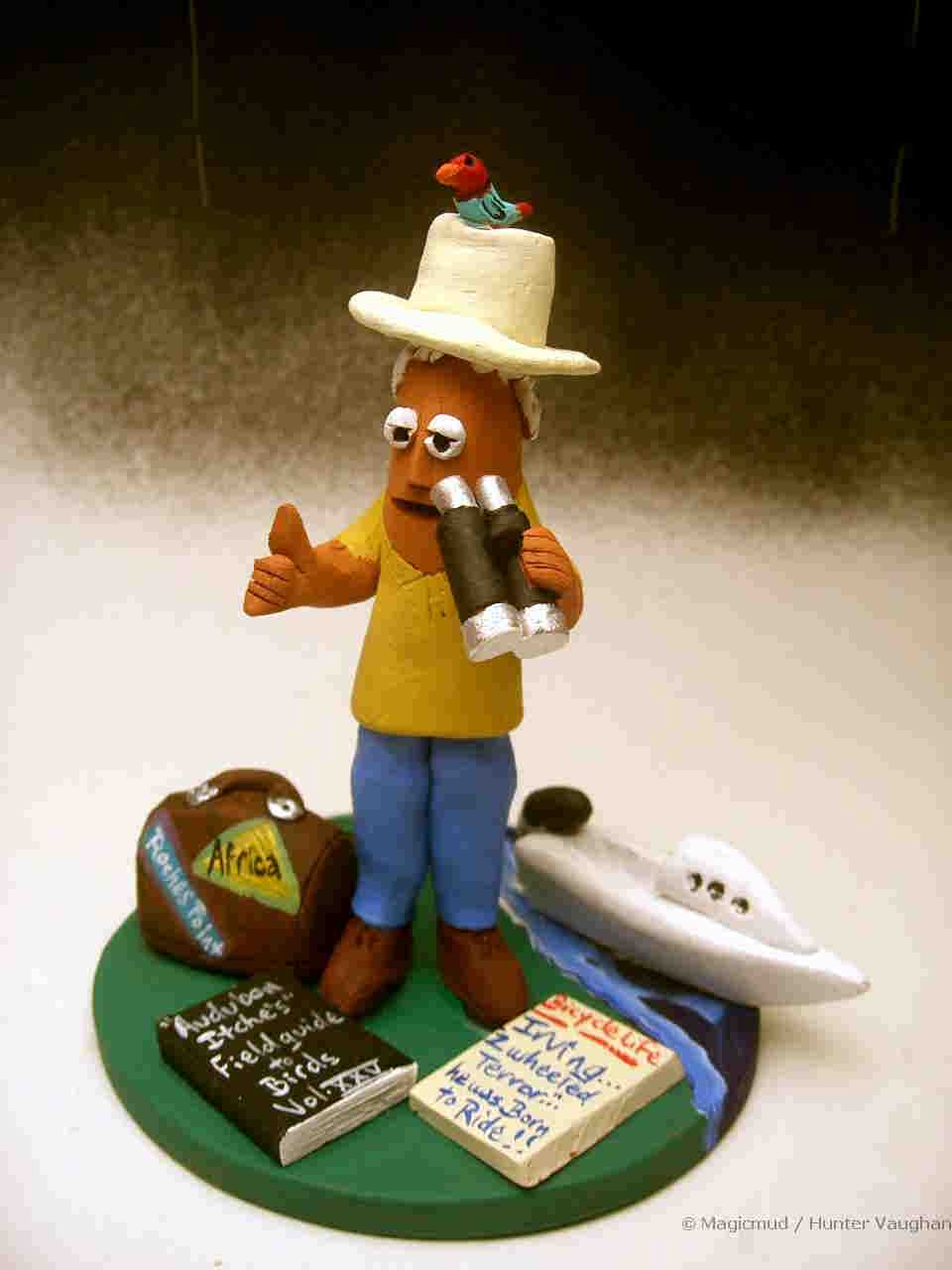 Custom made birthday gift for a bird watcher! ...with his boat, destination strewn suitcase and friend on his safari hat!