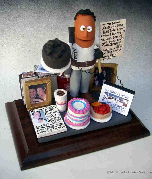 Ceramic figurine shows the "handyman" side of this propreitor of one of New York City's finest bakeries