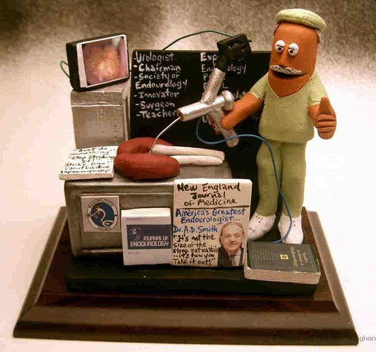 Great Surgeon's Gift!...a clay caricature of the Doctor with his scope and treating kidneys