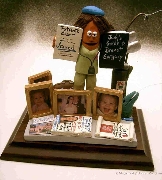 Personalized gift for a female Surgeon....a custom made caly caricature of the Doctor, with pictures of Her Family in the background