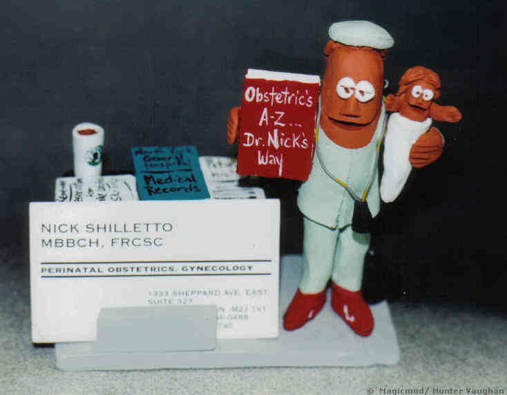 Pediatrician Figurine card holder, a great way to display business cards in the office.