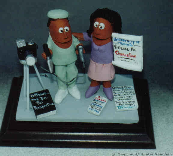 Original gift idea for a Medical Specialist...this figurine has the Surgeon who like photography with his Wife, the Chancellor of University of Toronto.