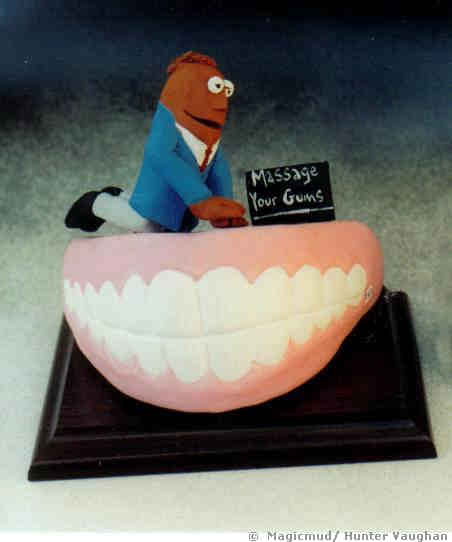 Periodontist Figurine "Massage Your Gums"