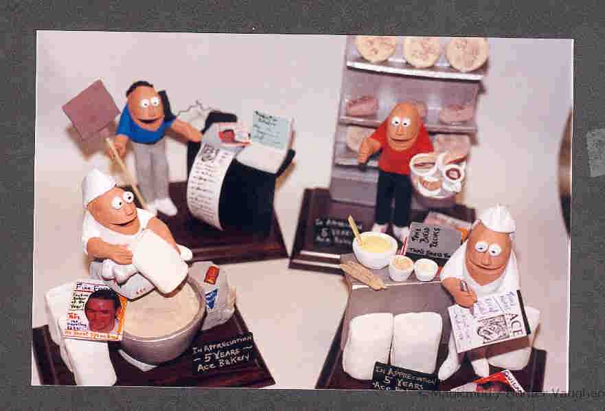 Promotional figurines of bakers in action, any occupational statue can be made to order.