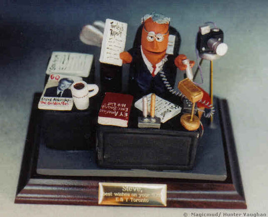 Trophy figurine of accountant with his camera, cafe, golf clubs and more...