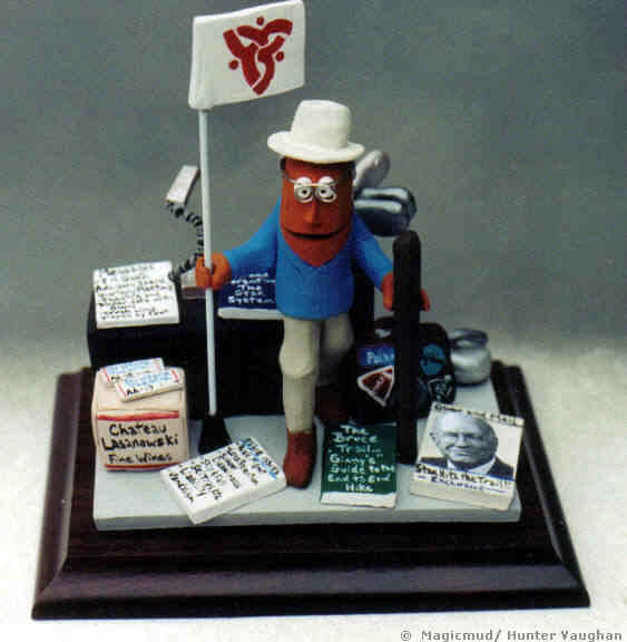 Retirement figurine with his corporate flag, golf bag, case of wine, "faux" magazine with his picture on it and other personalizations