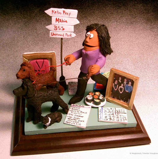 Custom figurine of her as she walks her dogs, with family photos and her knitting artwork in background. Great 50th Birthday Gift ...!